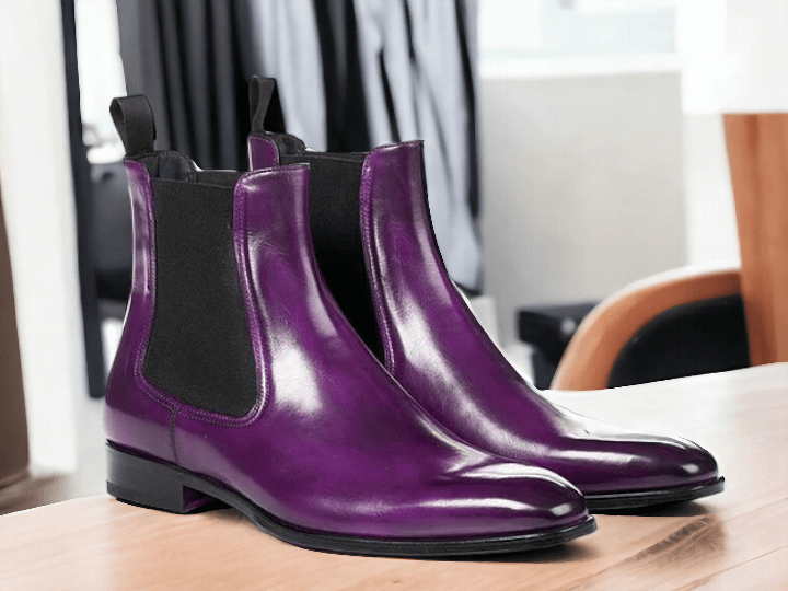 Expertly handcrafted, these Purple Chelsea Boots are the perfect combination of style and durability. Made with high-quality leather, these ankle-high boots are perfect for any party, providing both comfort and fashion. Elevate your wardrobe with these chic and versatile boots.