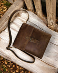 Classic brown messenger bag with secure push-lock closure
