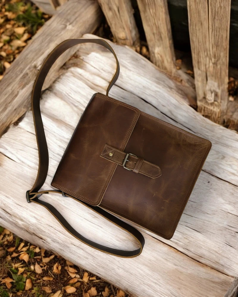 Classic brown messenger bag with secure push-lock closure