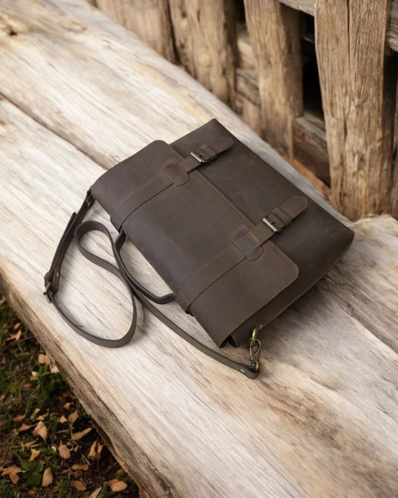 Travel-friendly leather shoulder bag with multiple pockets