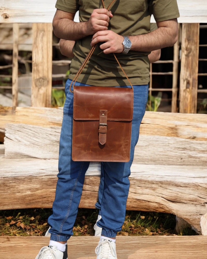 Weatherproof leather travel bag with secure clasps
