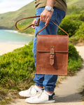 Full-grain leather messenger bag with adjustable crossbody strap