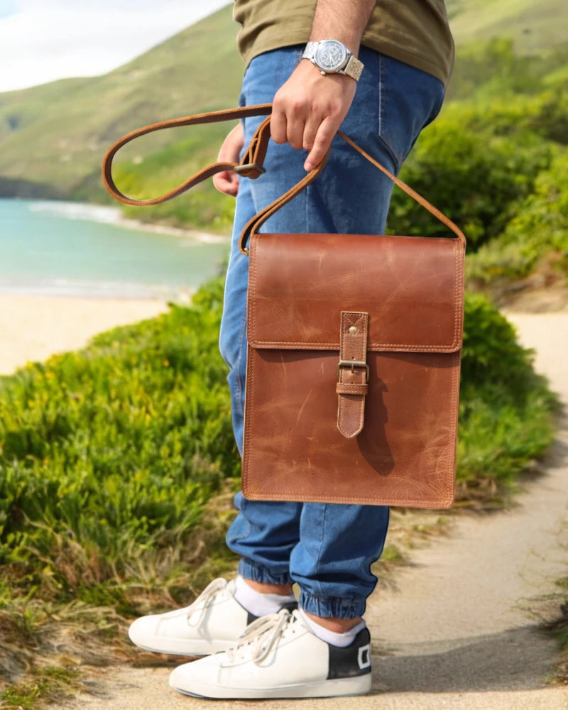 Full-grain leather messenger bag with adjustable crossbody strap
