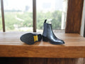 Classic black leather Chelsea boots with pull tab