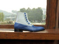 Elegant leather and suede button boots for men