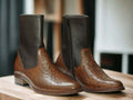 Elevate your style with Handmade Ostrich Print Brown Leather Boots for men. Ideal for both formal occasions and rugged adventures, these boots seamlessly blend luxury and durability. Crafted by hand from genuine ostrich leather, they offer comfort and longevity, enhancing any outfit effortlessly.