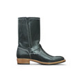 Rear view of black leather boots highlighting sturdy heel and structure.