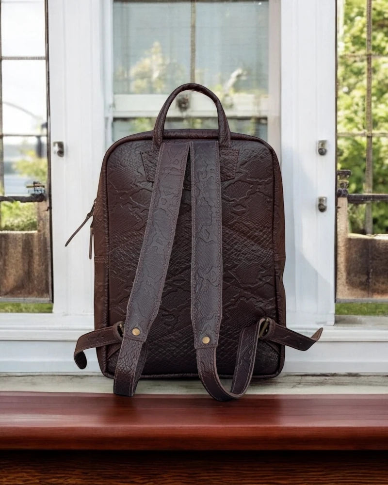Luxury leather backpack with adjustable straps and brass hardware