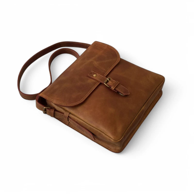 Handmade full-grain leather texture close-up – Highlighting the natural grain and rich patina.