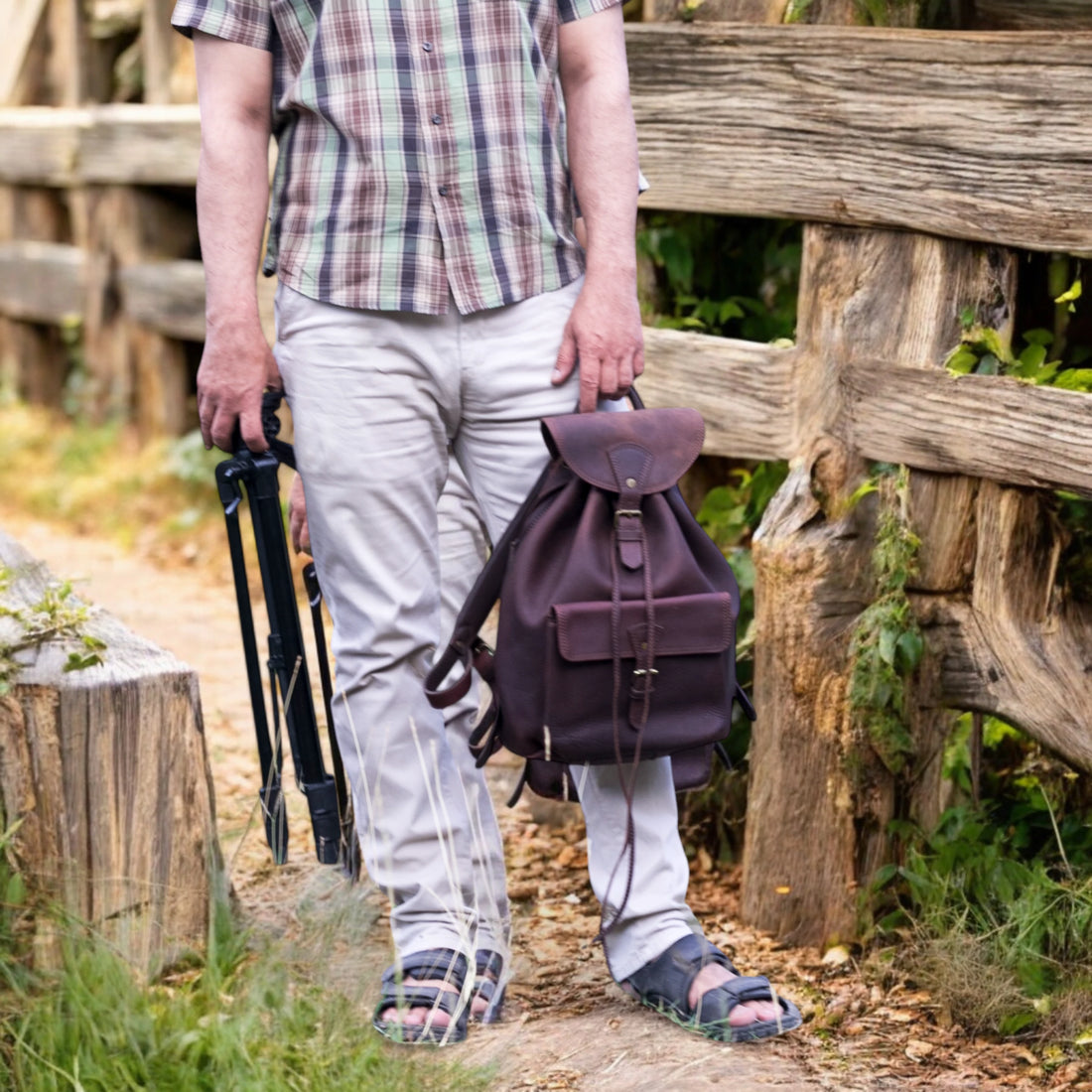 Full view of handmade full-grain leather backpack in brown.