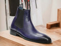 Expertly crafted by hand, these Navy Blue Chelsea Leather Boots are the perfect blend of style and comfort. Slip them on effortlessly and enjoy the durability and sleek design of these ankle boots. Elevate your wardrobe with these high-quality, handmade boots.