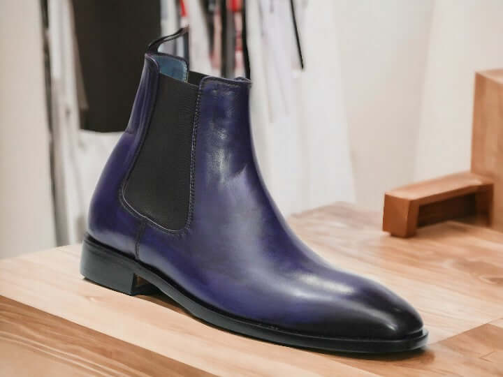 Expertly crafted by hand, these Navy Blue Chelsea Leather Boots are the perfect blend of style and comfort. Slip them on effortlessly and enjoy the durability and sleek design of these ankle boots. Elevate your wardrobe with these high-quality, handmade boots.