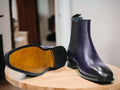 Expertly crafted by hand, these Navy Blue Chelsea Leather Boots are the perfect blend of style and comfort. Slip them on effortlessly and enjoy the durability and sleek design of these ankle boots. Elevate your wardrobe with these high-quality, handmade boots.
