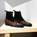 High-quality genuine leather sole of Handmade Brown & Black Suede Cap Toe Ankle Boots for superior durability.