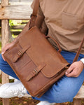 Vintage leather laptop briefcase with secure buckle closure