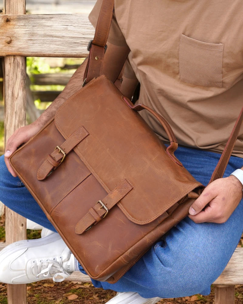 Vintage leather laptop briefcase with secure buckle closure