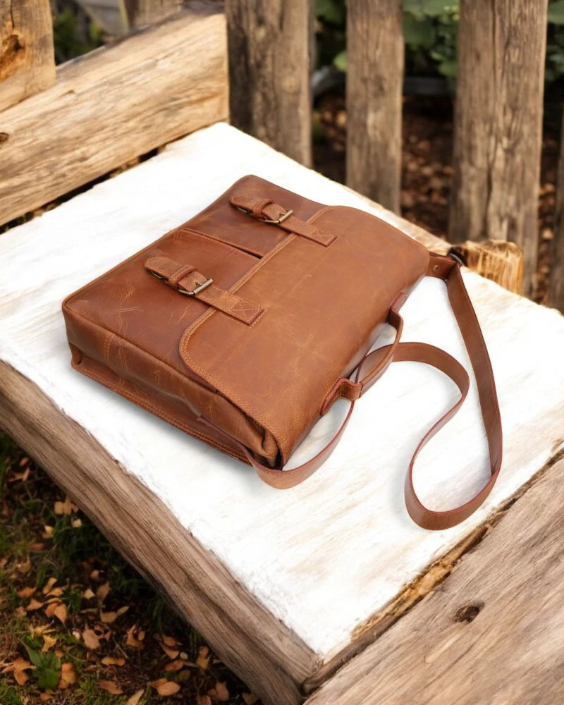Handmade brown leather laptop bag with crossbody strap