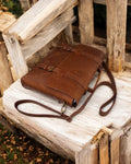 Black leather briefcase with brass hardware and secure clasps