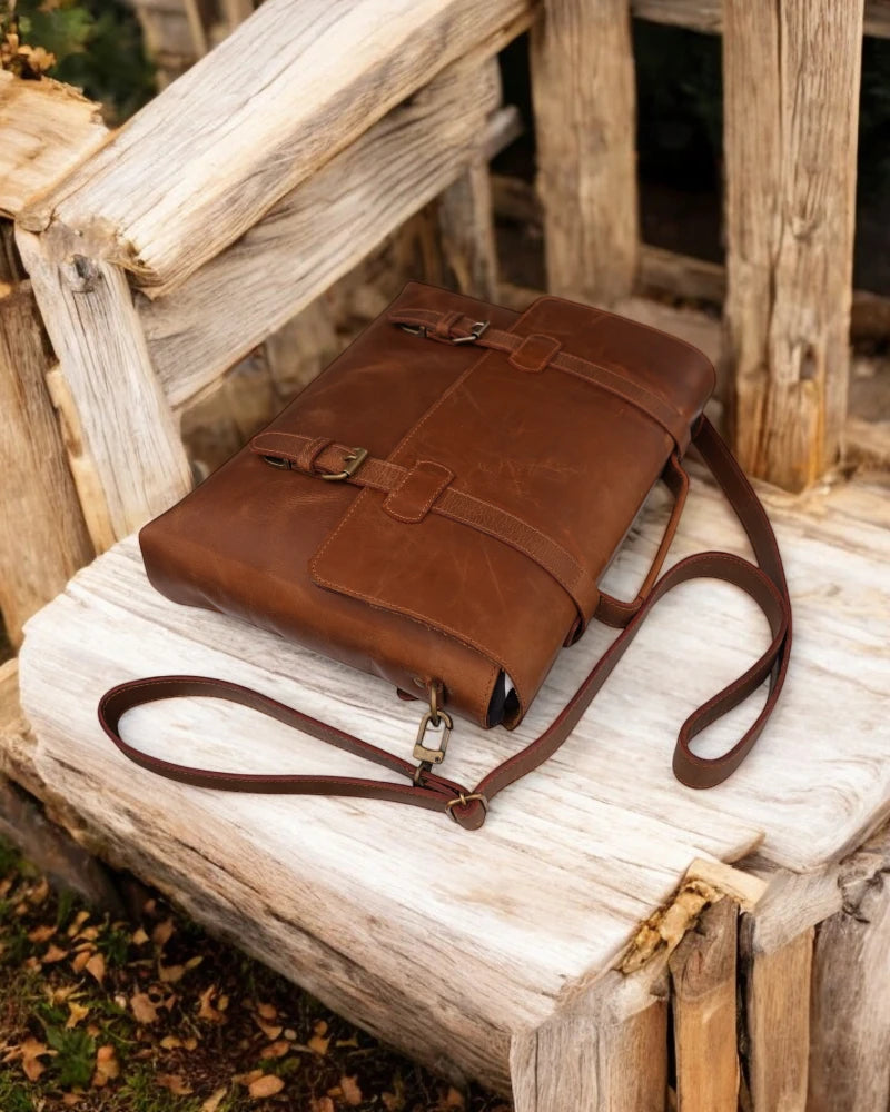 Black leather briefcase with brass hardware and secure clasps