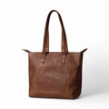 Interior of the bag featuring soft cotton lining and organized storage pockets.

