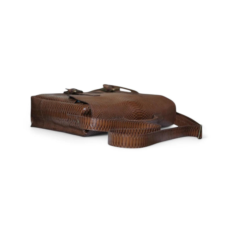 Angled Side Profile with Strap – Highlighting the depth and structure of the bag

